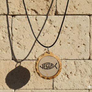 Marble stone pendant with engraving framed in olive wood