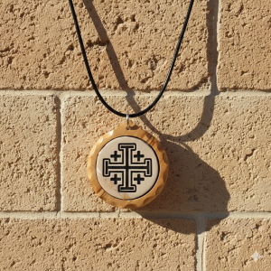 marble stone pendant with Jerusalem cross engraving framed in olive wood