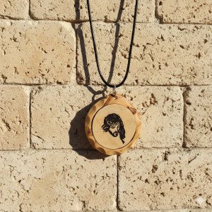 Marble stone pendant with Jesus engraving framed in olive wood